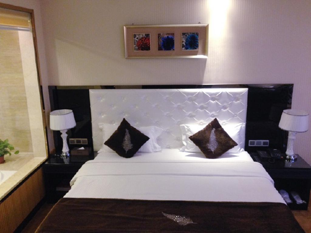 Tianguo Times Hotel Foshan Quarto foto